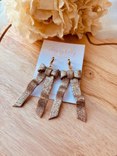 Load image into Gallery viewer, Large Gold Bow Huggie
